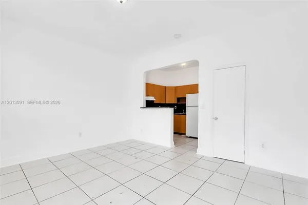a view of a room with an empty space
