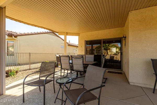 a house view with a outdoor seating space