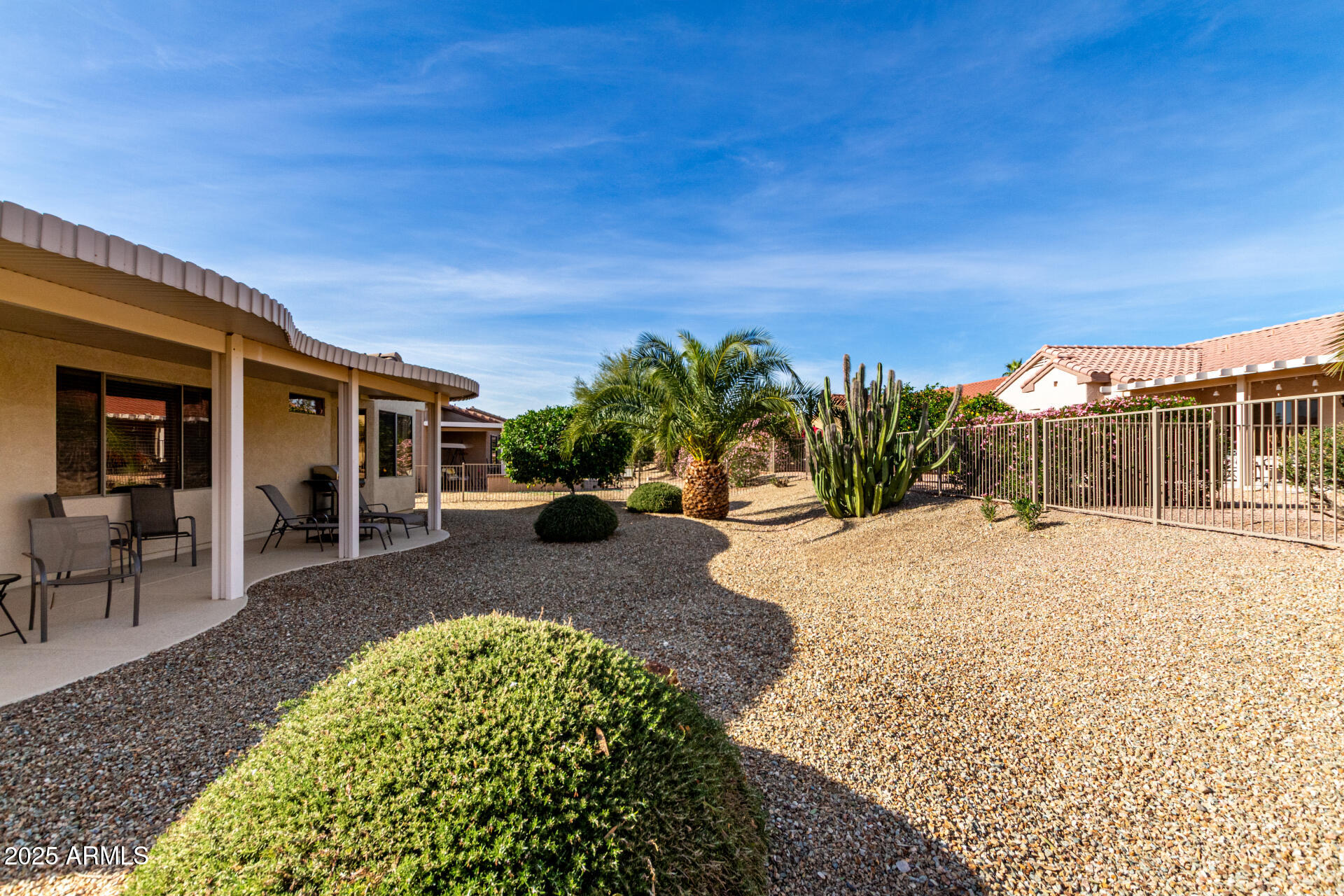 15448 West Moonlight Way Surprise, AZ 85374 - Photo 23 of 26 a view of a house with backyard and sitting area