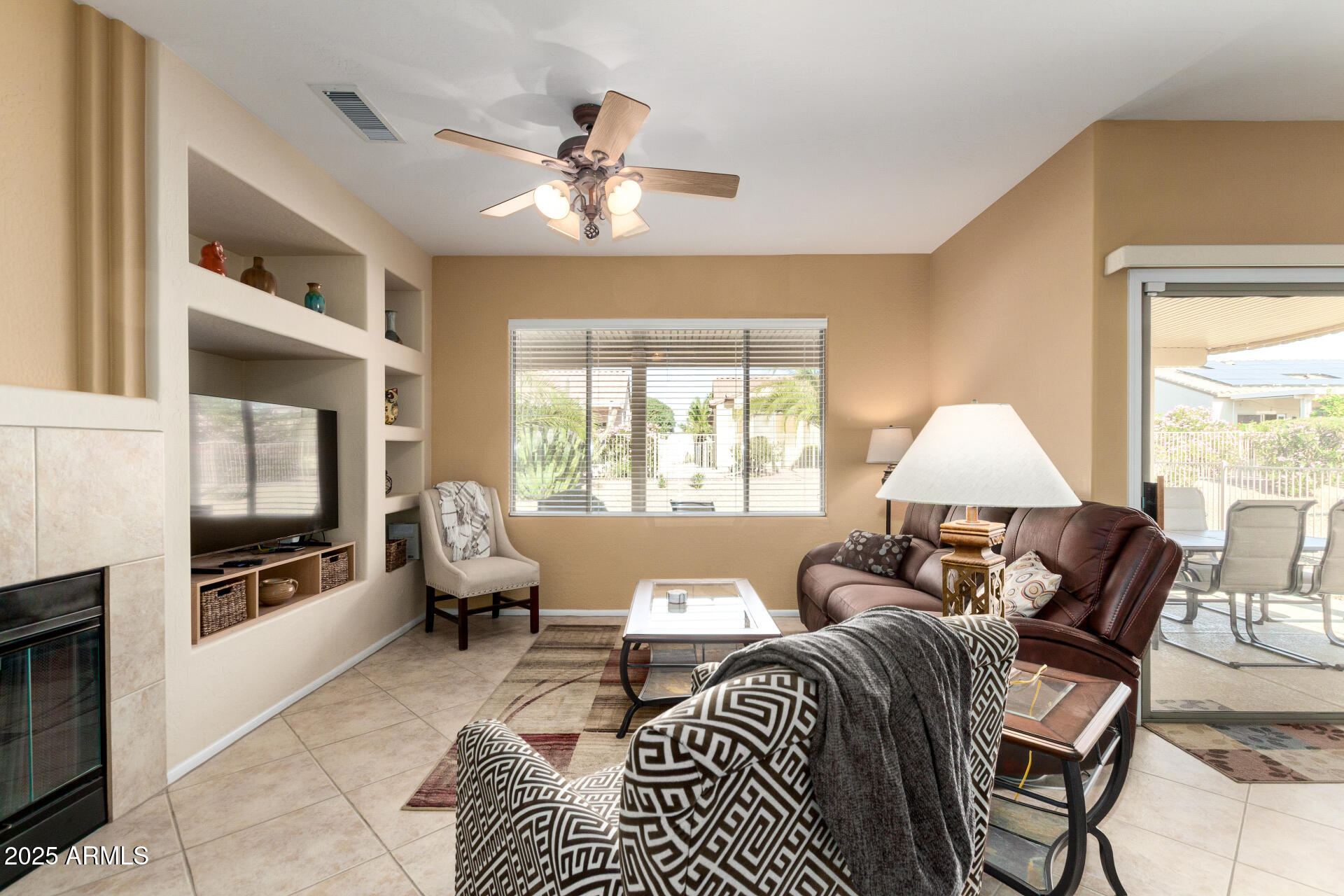 15448 West Moonlight Way Surprise, AZ 85374 - Photo 4 of 26 a living room with furniture and a window