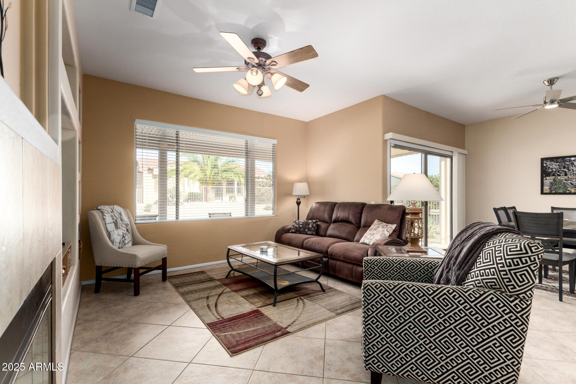 15448 West Moonlight Way Surprise, AZ 85374 - Photo 5 of 26 a living room with furniture and a large window
