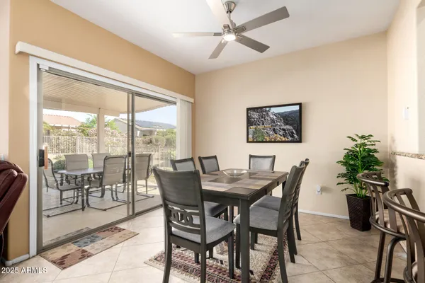 a kitchen with sink and refrigerator