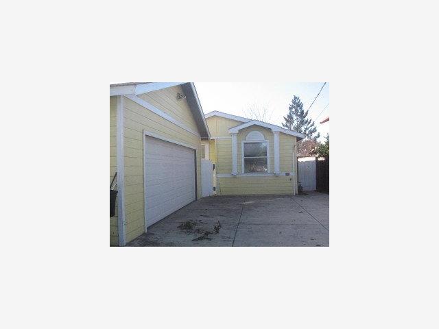 140 South Rengstorff Avenue Mountain View, CA 94040 - Photo 1 of 5 a living room with a couch and chandelier
