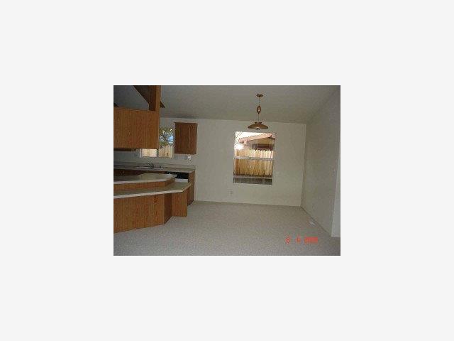 140 South Rengstorff Avenue Mountain View, CA 94040 - Photo 2 of 5 a kitchen with a sink and cabinets
