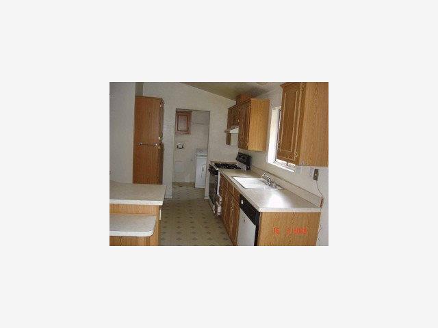 140 South Rengstorff Avenue Mountain View, CA 94040 - Photo 5 of 5 a bathroom with a sink a mirror and a bathtub