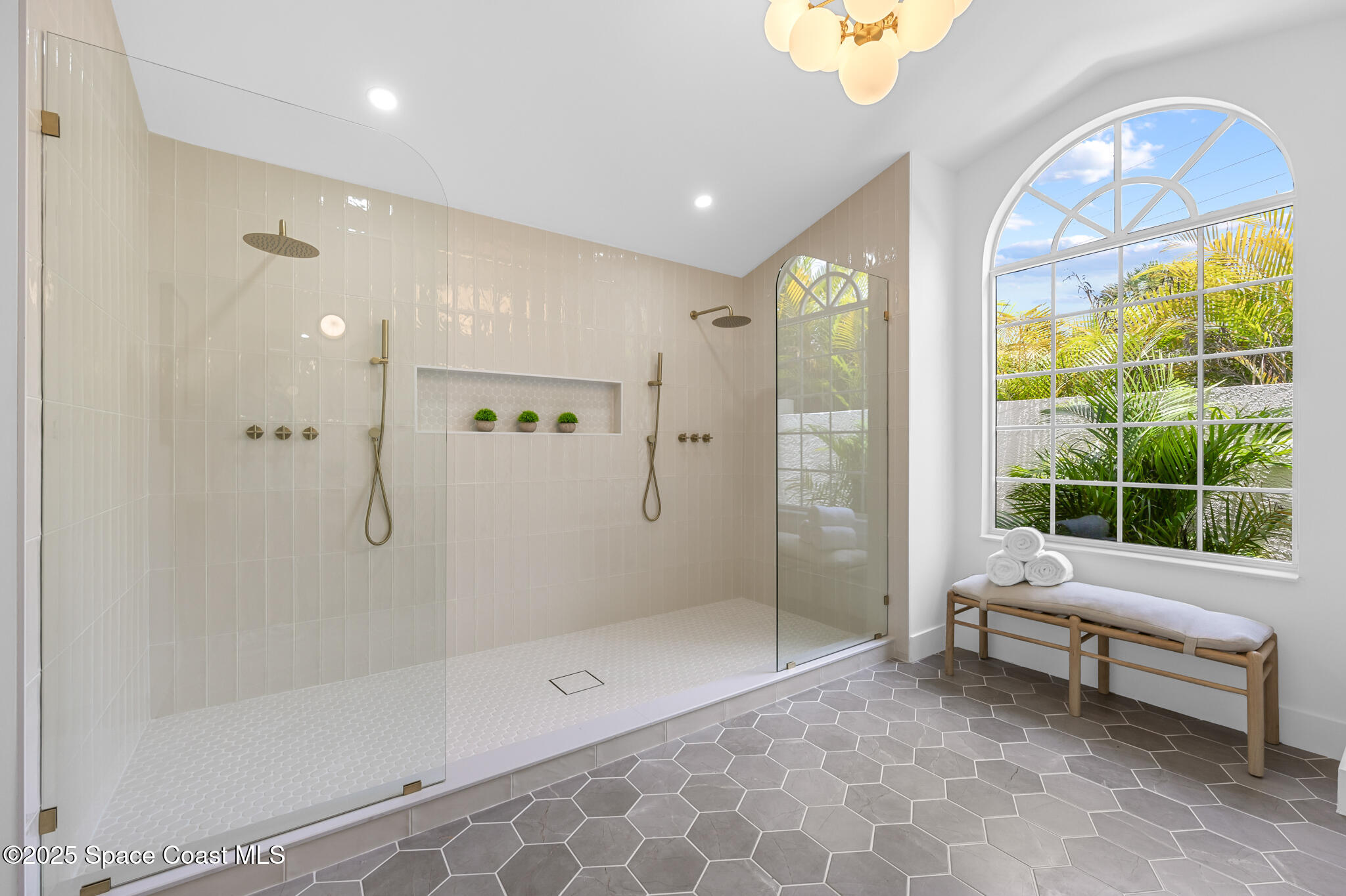 4340 Windover Way Melbourne, FL 32934 - Photo 29 of 42 a bathroom with a bathtub and a shower