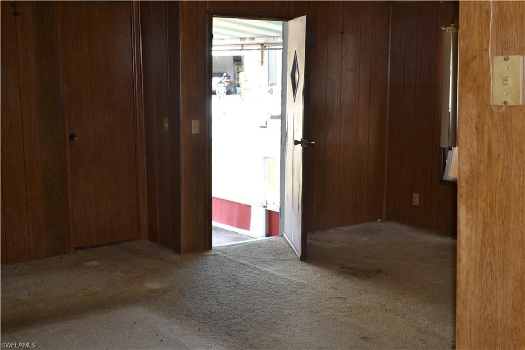 3980 New Moon Court Naples, FL 34112 - Photo 4 of 10 a view of an empty room