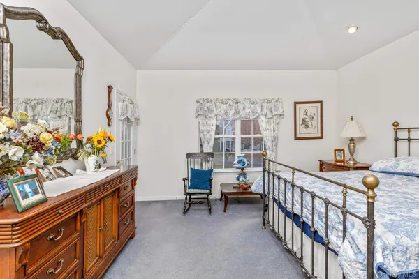 a view of a room with furniture and toys