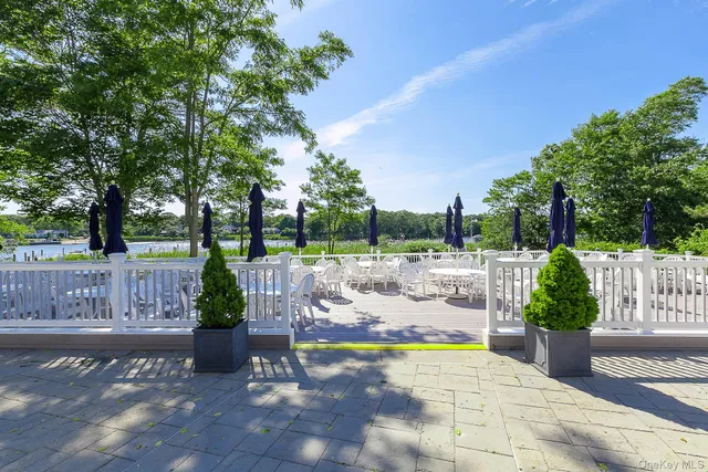 a park view with a wooden bridge