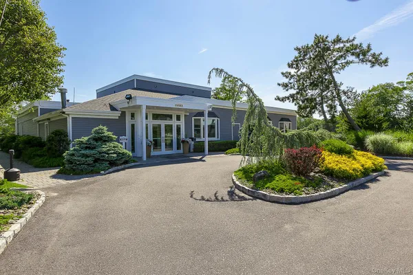 a view of a pathway with a bench