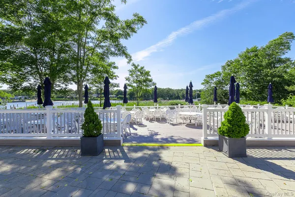 a park view with a wooden bridge