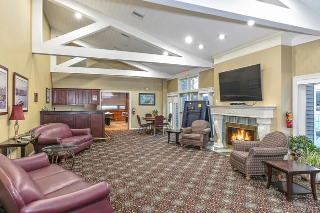 a room with lots of tables and chairs