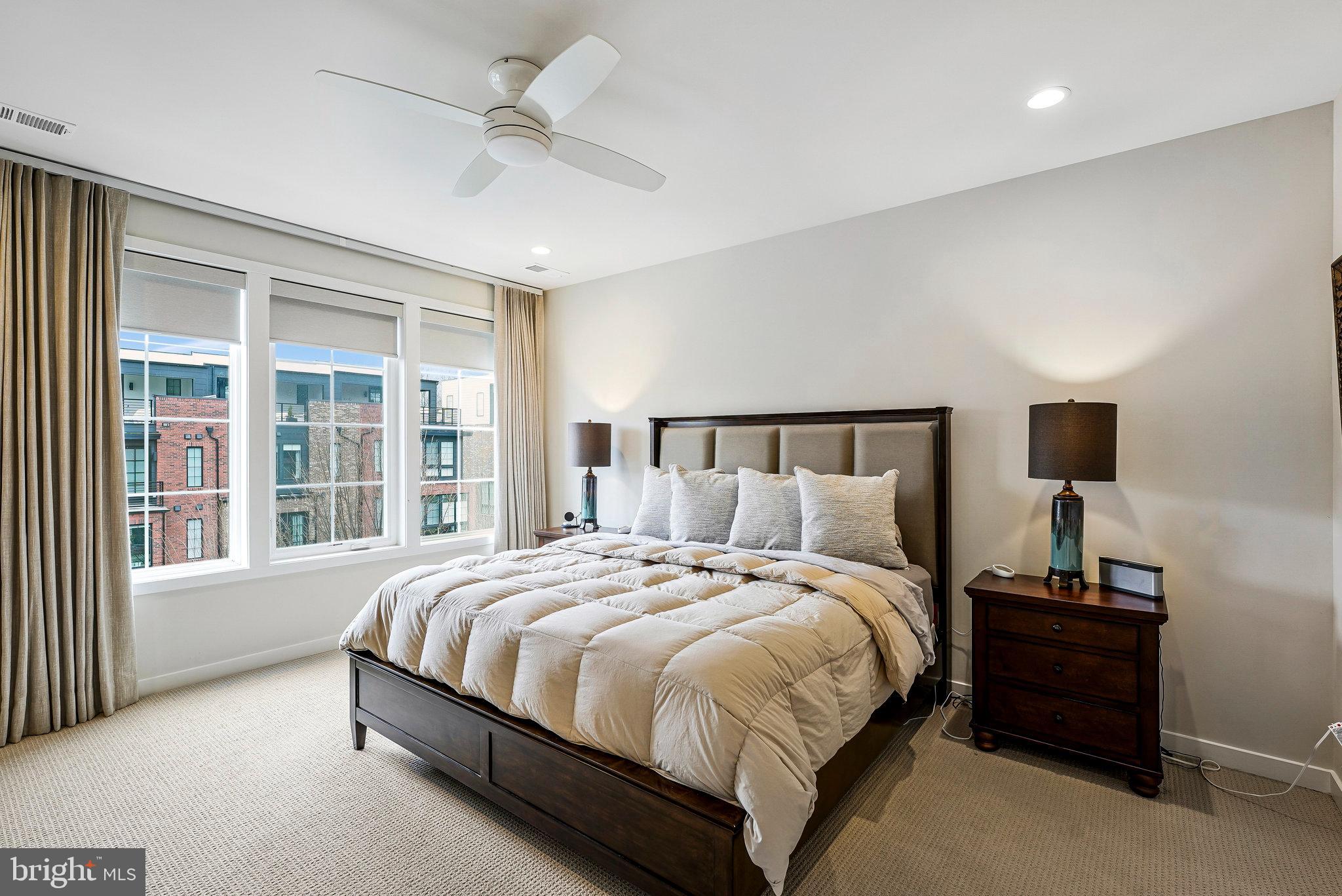 11716 Paysons Way Reston, VA 20191 - Photo 22 of 34 a bedroom with a bed and a window