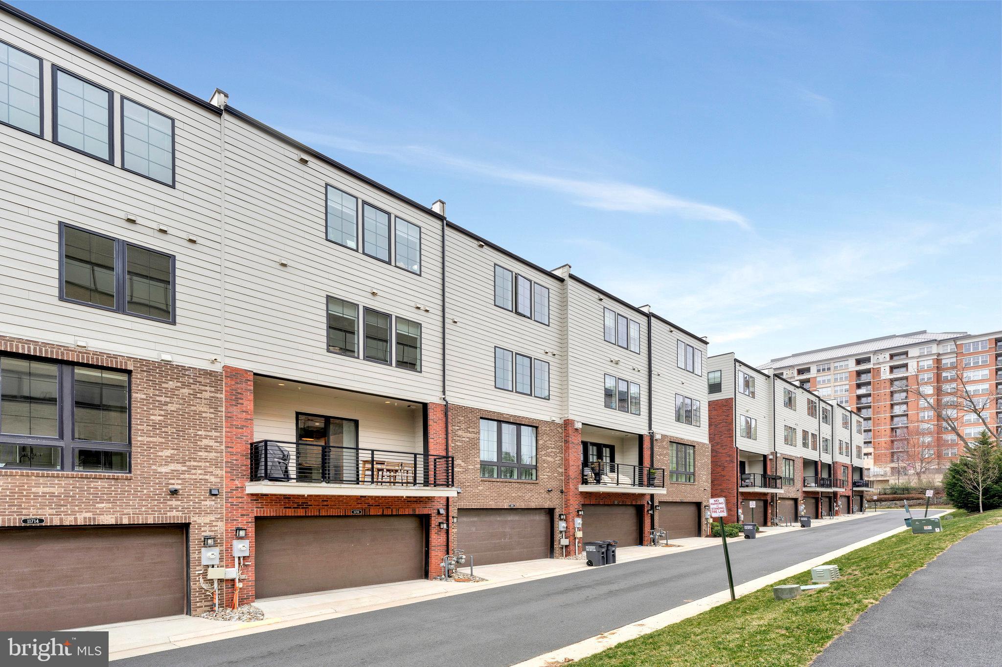 11716 Paysons Way Reston, VA 20191 - Photo 33 of 34 a front view of a building with street view