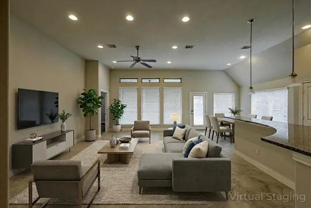 a kitchen with granite countertop wooden cabinets a sink and dishwasher
