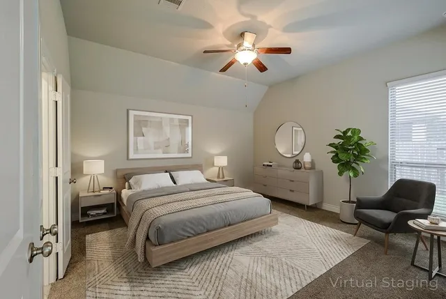 a view of a house with backyard and porch