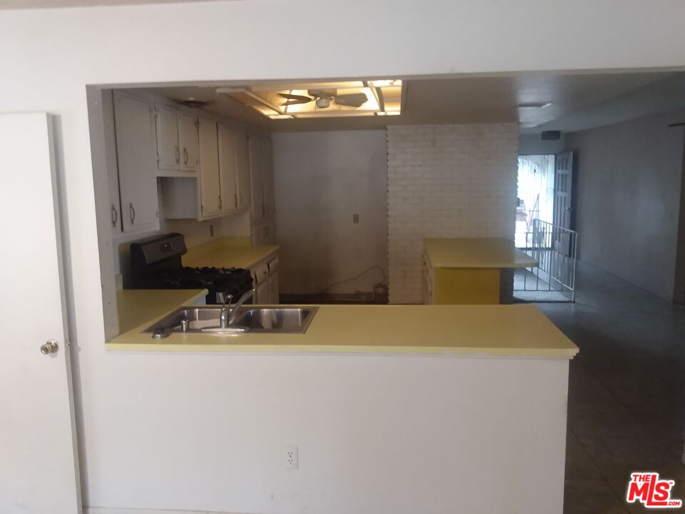 18420 Granite Avenue Riverside, CA 92508 - Photo 3 of 7 a room with storage and utility