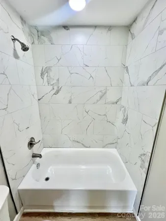 a bathroom with a bathtub