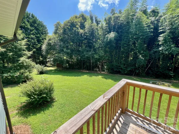 a view of backyard with green space
