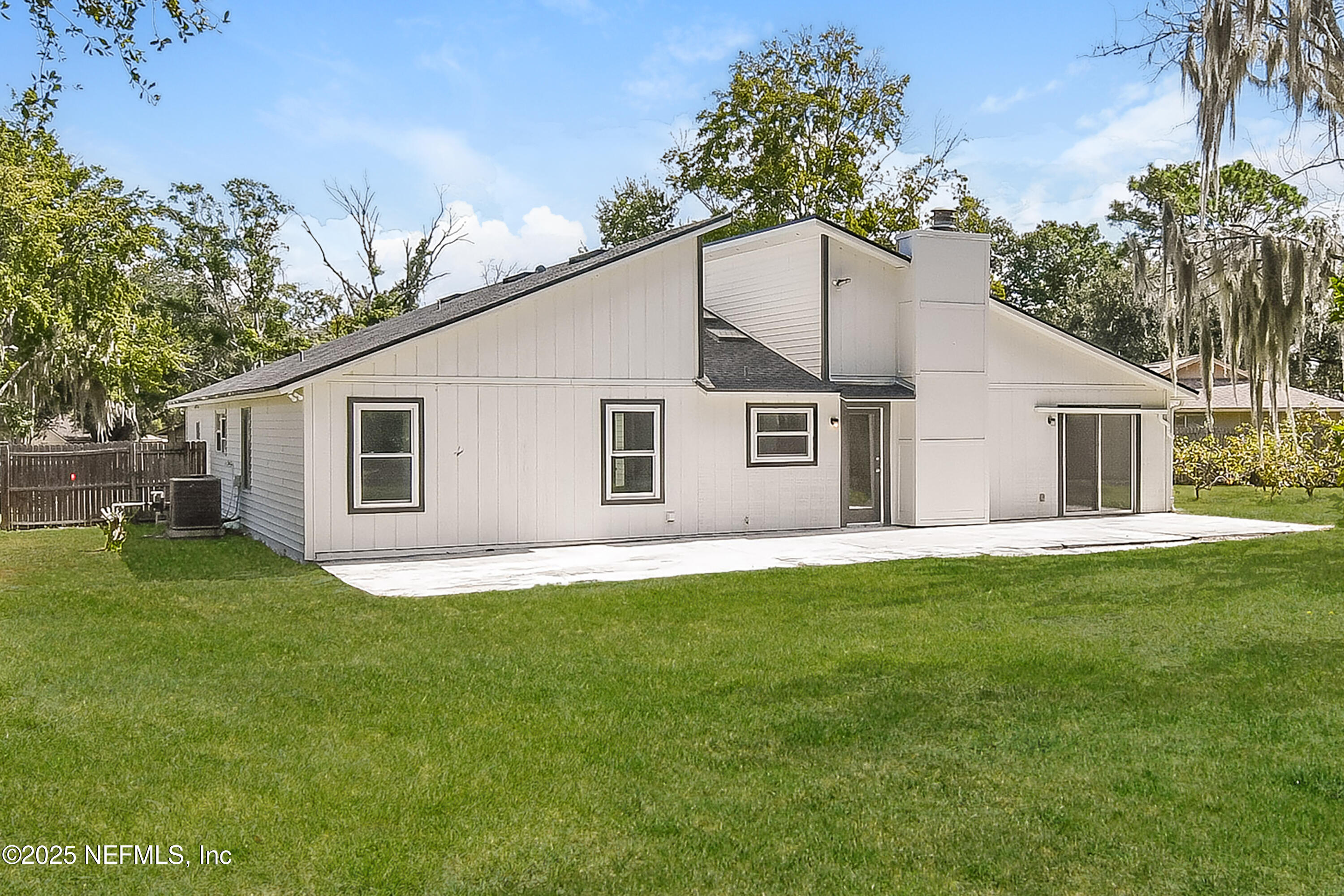 1064 Rene Court Orange Park, FL 32065 - Photo 19 of 20 a house that has a big yard in front of it