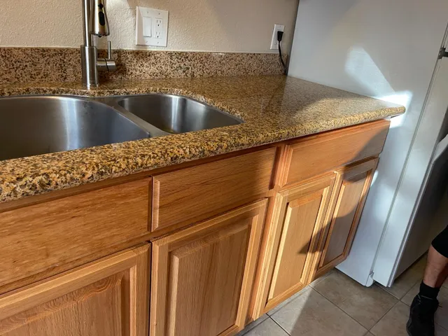a view closed with a granite countertop sink