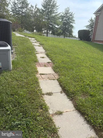 a view of a garden with an outdoor space