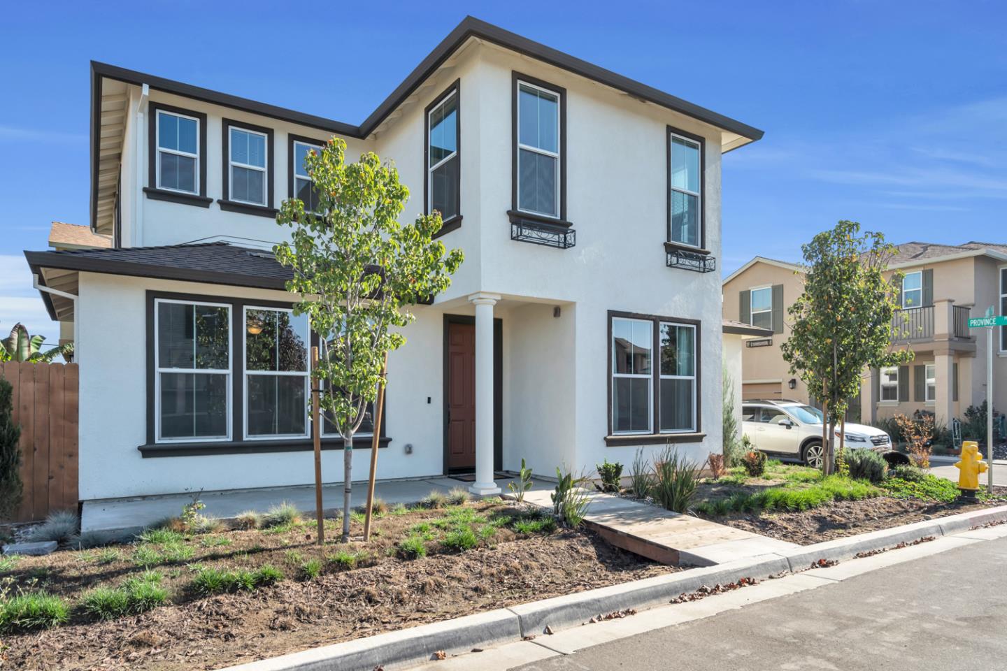 2284 Province Place Hughson, CA 95326 - Photo 2 of 53 a front view of a house with garden