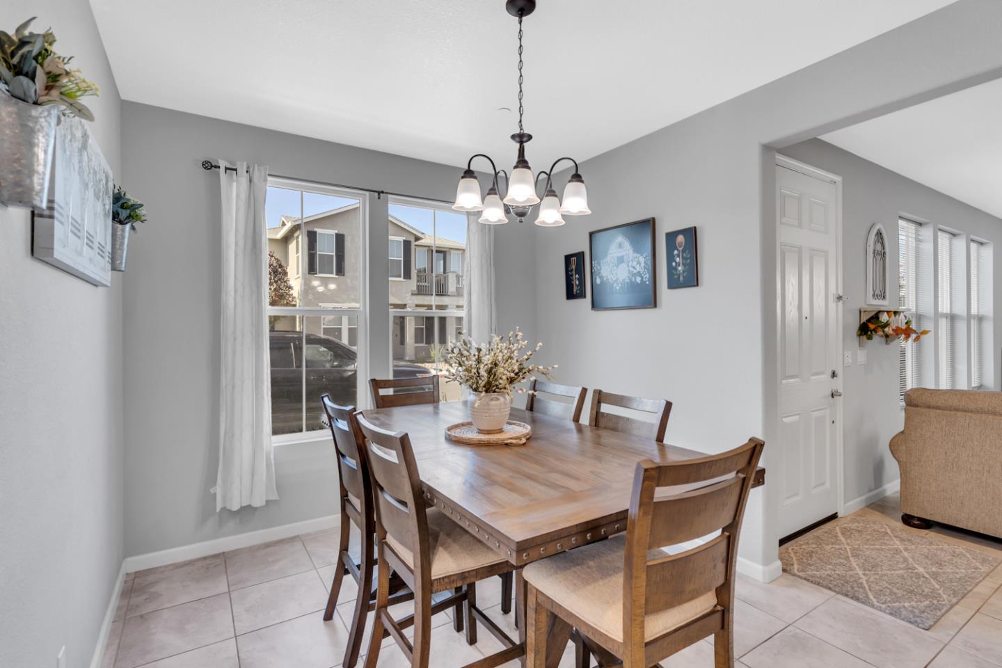 2284 Province Place Hughson, CA 95326 - Photo 14 of 53 a view of a dining room with furniture and chandelier