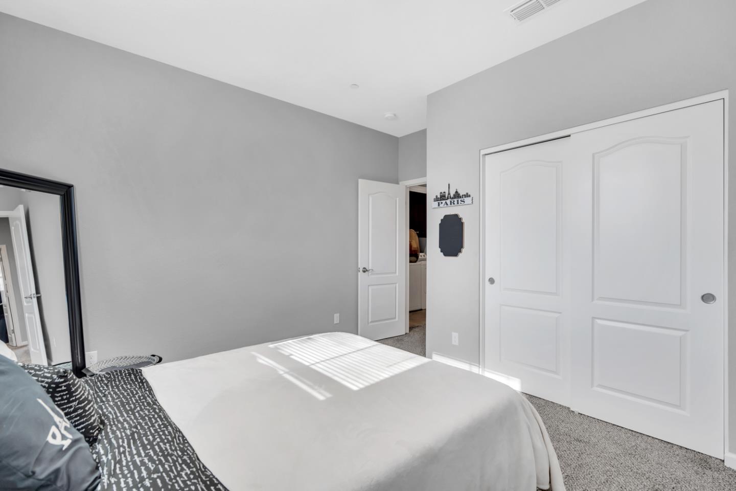 2284 Province Place Hughson, CA 95326 - Photo 38 of 53 a bedroom with a bed and a mirror