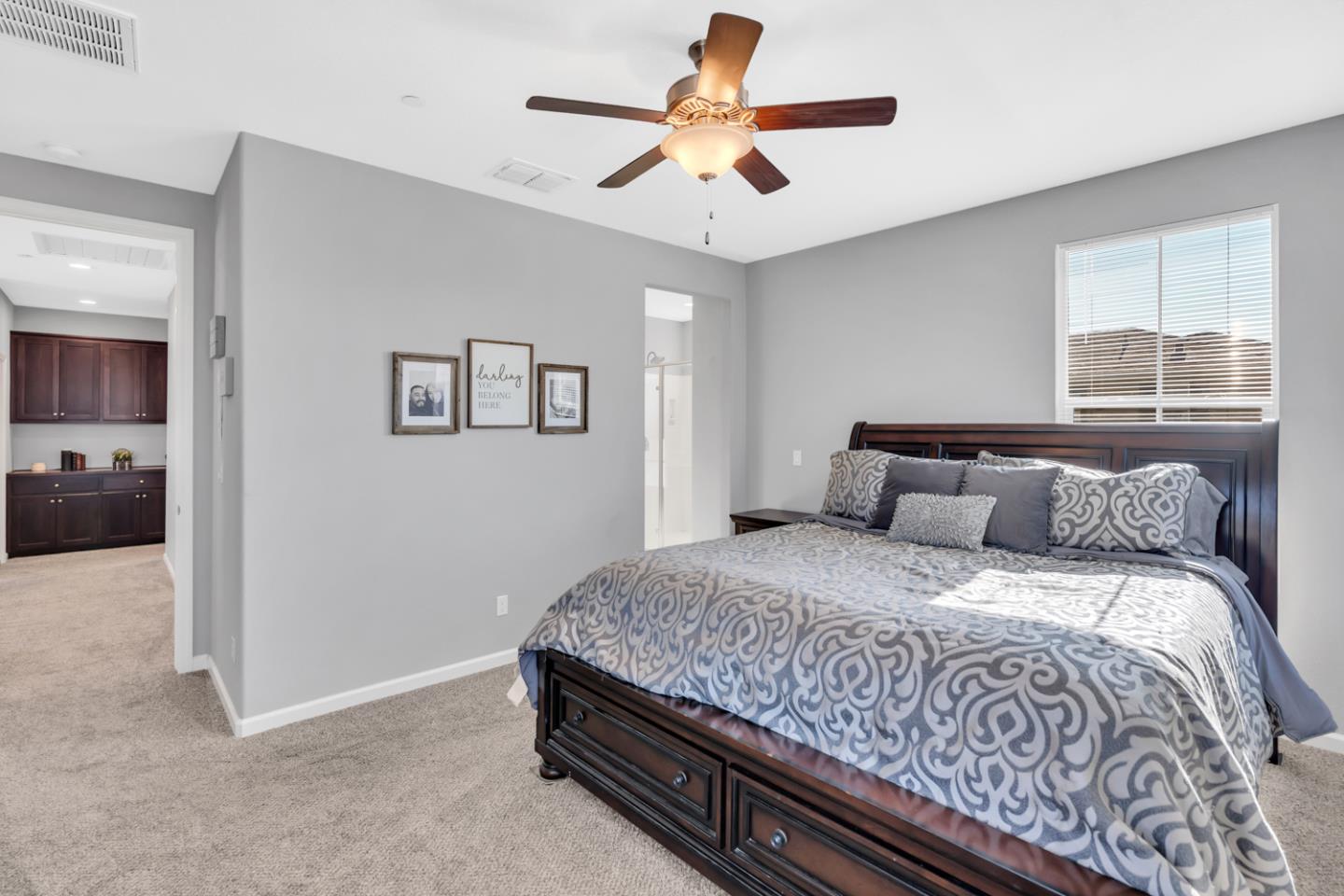 2284 Province Place Hughson, CA 95326 - Photo 44 of 53 a bedroom with a bed and a chandelier