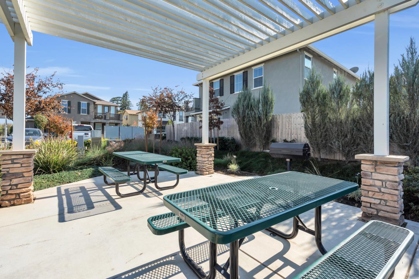 2284 Province Place Hughson, CA 95326 - Photo 53 of 53 a view of a patio with table and chairs and potted plants