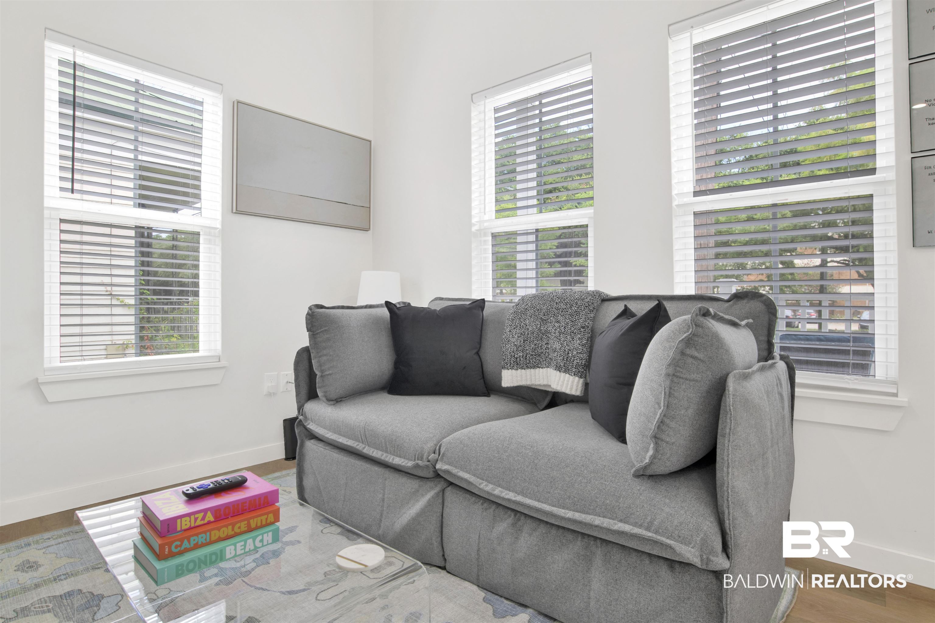 555 Congress Street Mobile, AL 36603 - Photo 21 of 27 Living area featuring wood finished floors and baseboards