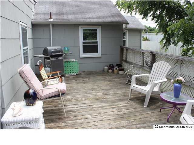 302 Church Road Brick, NJ 08723 - Photo 13 of 13 a view of a chairs and table in patio