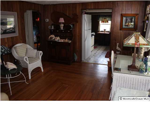 302 Church Road Brick, NJ 08723 - Photo 4 of 13 a black and white photo of a living room