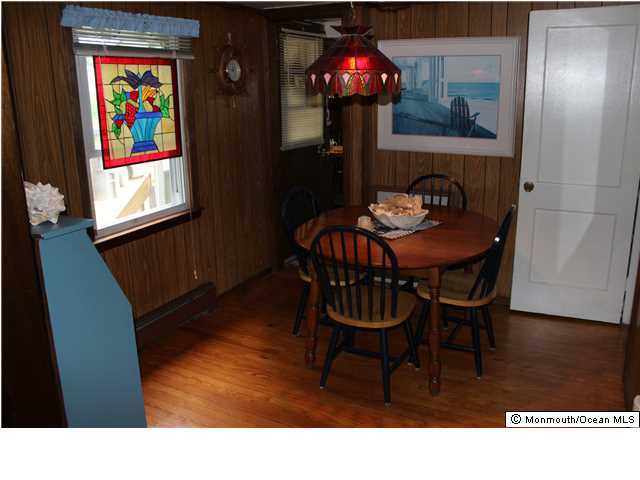 302 Church Road Brick, NJ 08723 - Photo 5 of 13 a dining room with furniture and window