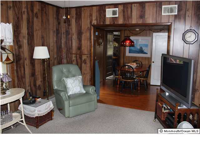302 Church Road Brick, NJ 08723 - Photo 7 of 13 a living room with furniture and a flat screen tv