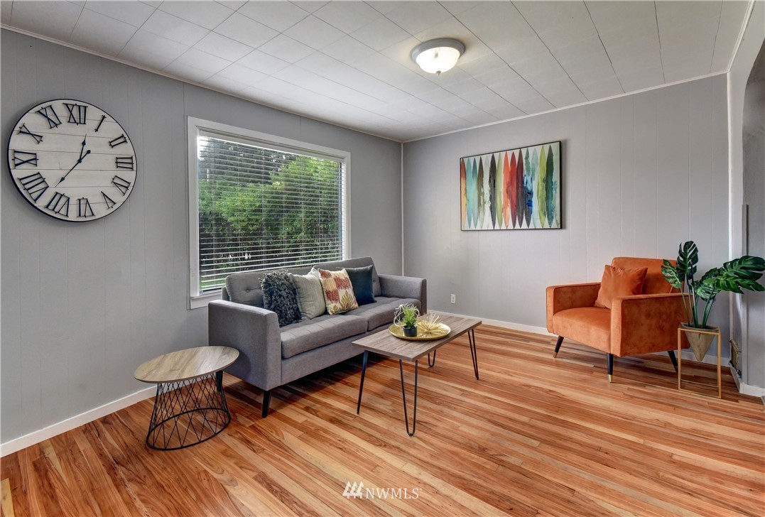 6930 Lower Ridge Road Everett, WA 98203 - Photo 2 of 15 a living room with furniture and a large window