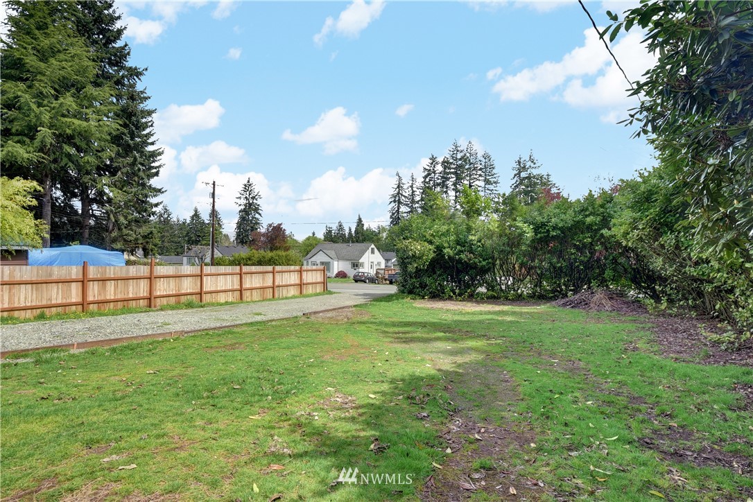 6930 Lower Ridge Road Everett, WA 98203 - Photo 12 of 15 a view of a green yard
