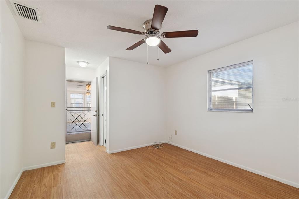 822 3rd Avenue Northwest Largo, FL 33770 - Photo 44 of 75 a view of an empty room and wooden floor