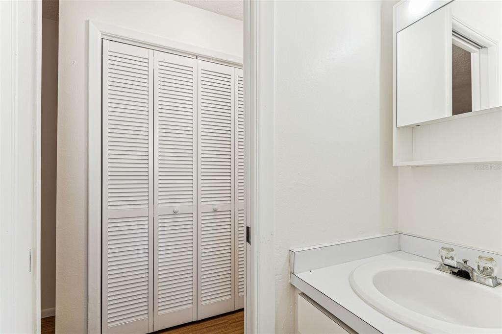 822 3rd Avenue Northwest Largo, FL 33770 - Photo 50 of 75 a bathroom with a sink and a window