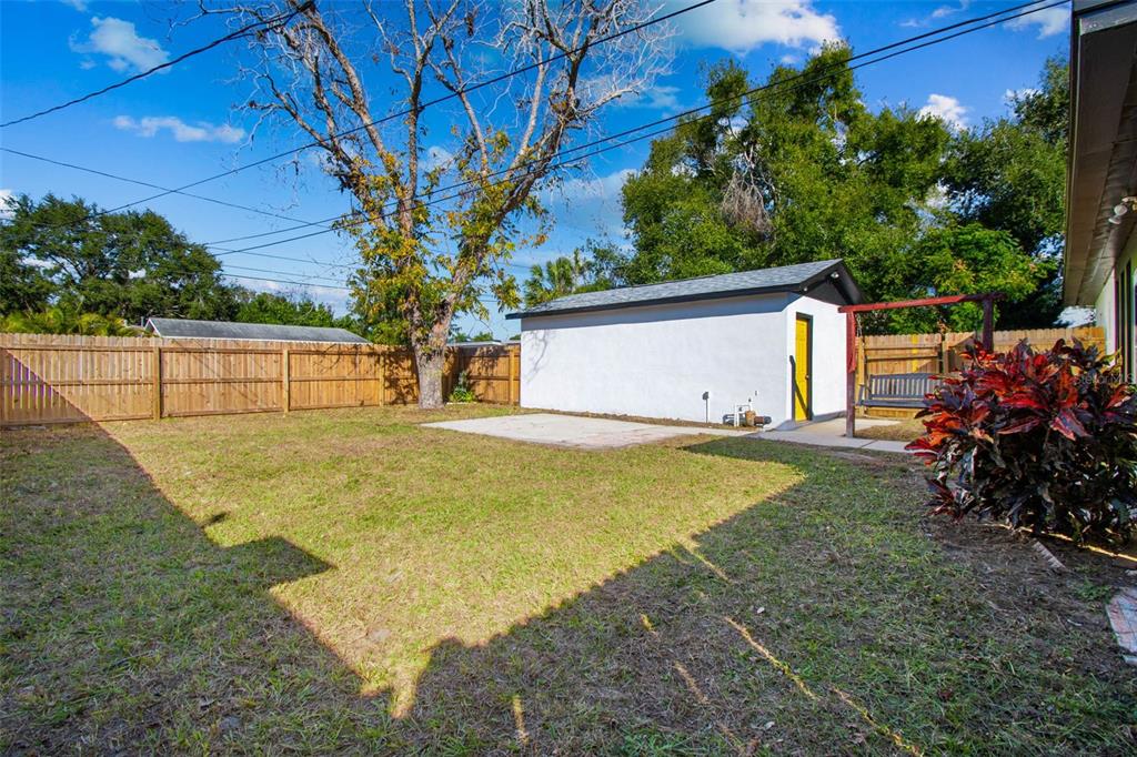 822 3rd Avenue Northwest Largo, FL 33770 - Photo 61 of 75 a view of backyard of house with trees