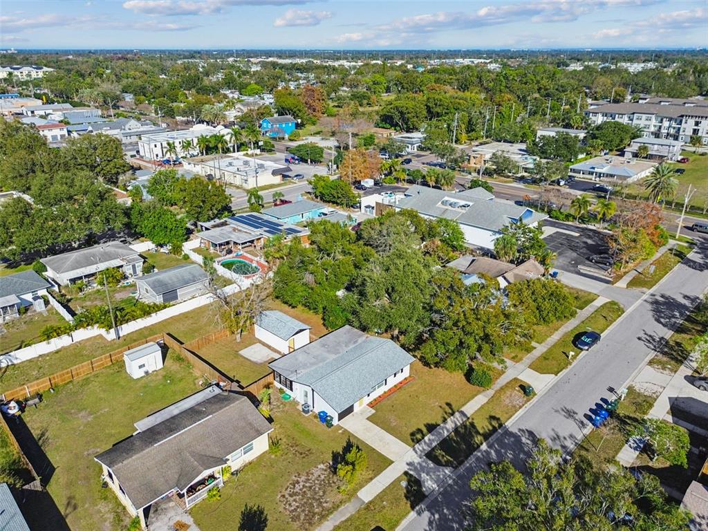 822 3rd Avenue Northwest Largo, FL 33770 - Photo 73 of 75 an aerial view of residential houses with outdoor space