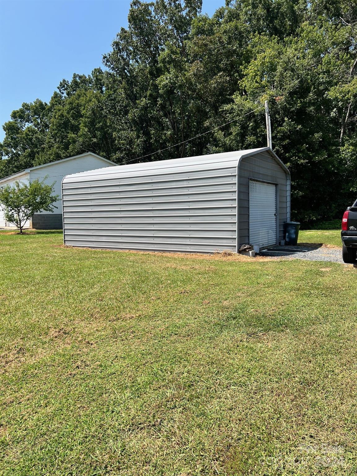 414 Drye Road Polkton, NC 28135 - Photo 11 of 12 a house view with a garden space
