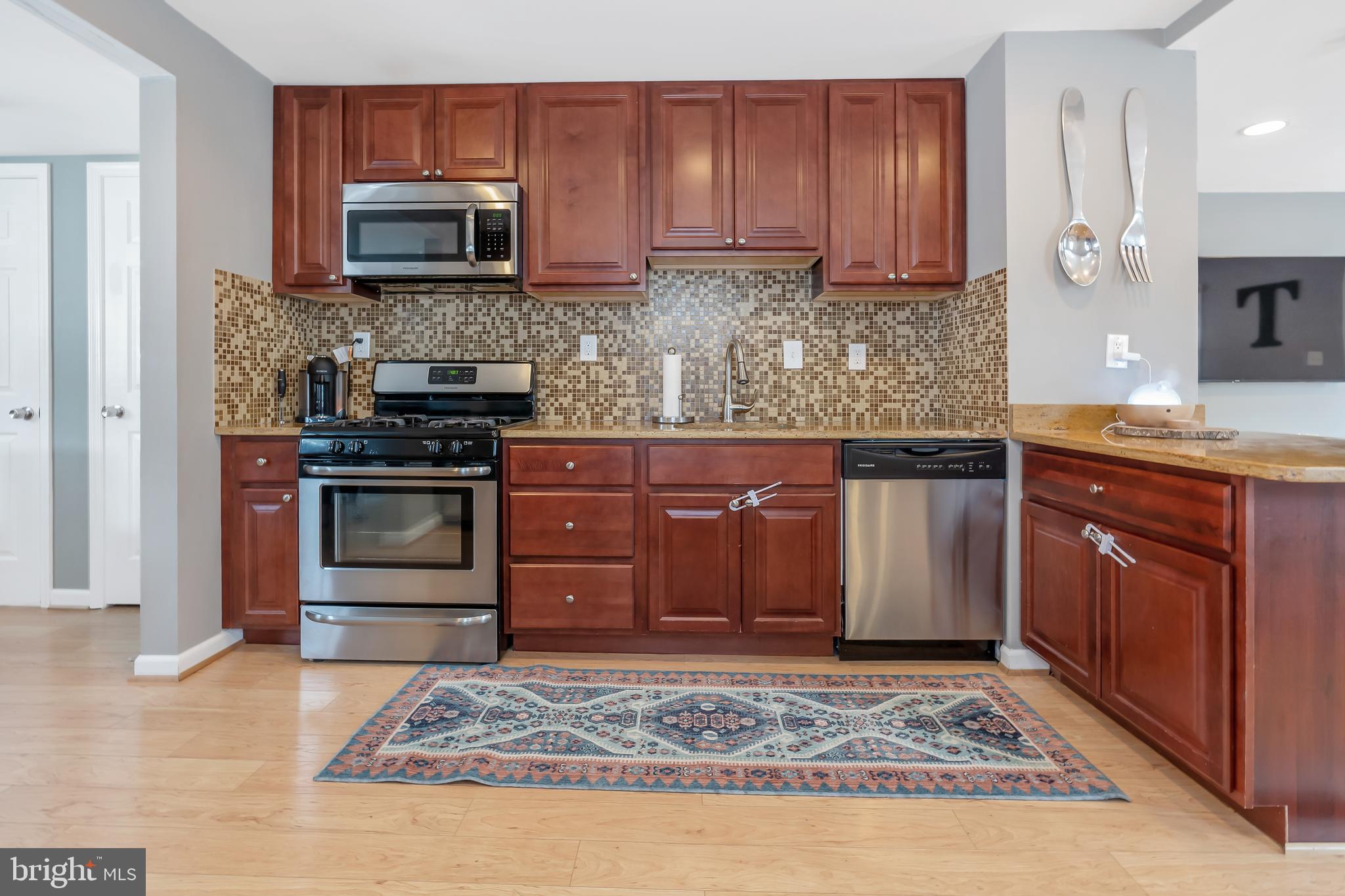 107 Alcock Road Baltimore, MD 21221 - Photo 10 of 29 Beautiful Cabinets Throughout the Kitchen