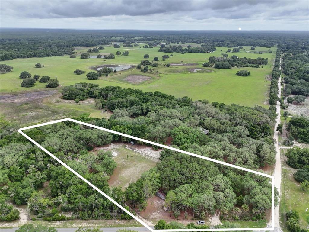 156 Kingfish Road Pomona Park, FL 32181 - Photo 53 of 55 a view of a field with an ocean