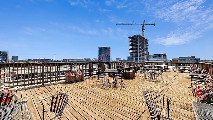312 North May Street, Unit 4H Chicago, IL 60607 - Photo 13 of 13 a view of a balcony with chairs
