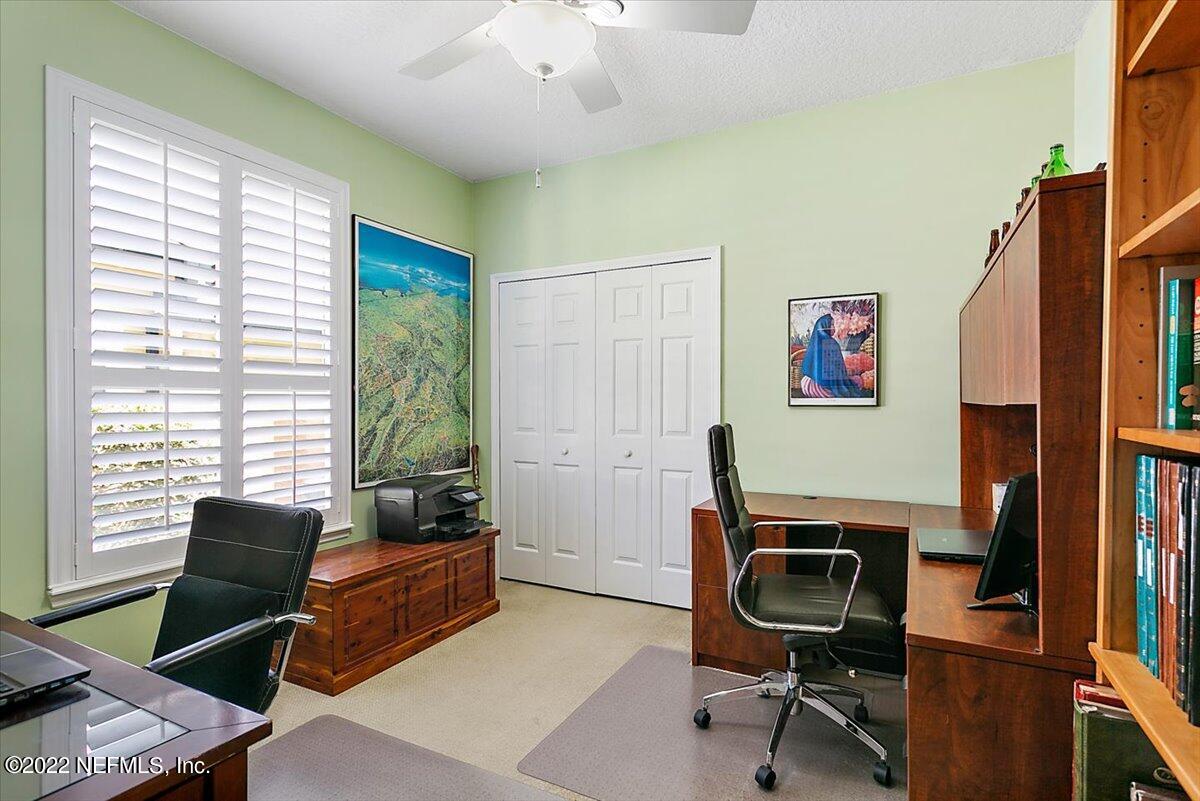184 Edge Of Woods Road St. Augustine, FL 32092 - Photo 17 of 24 a view of a livingroom with workspace and a window