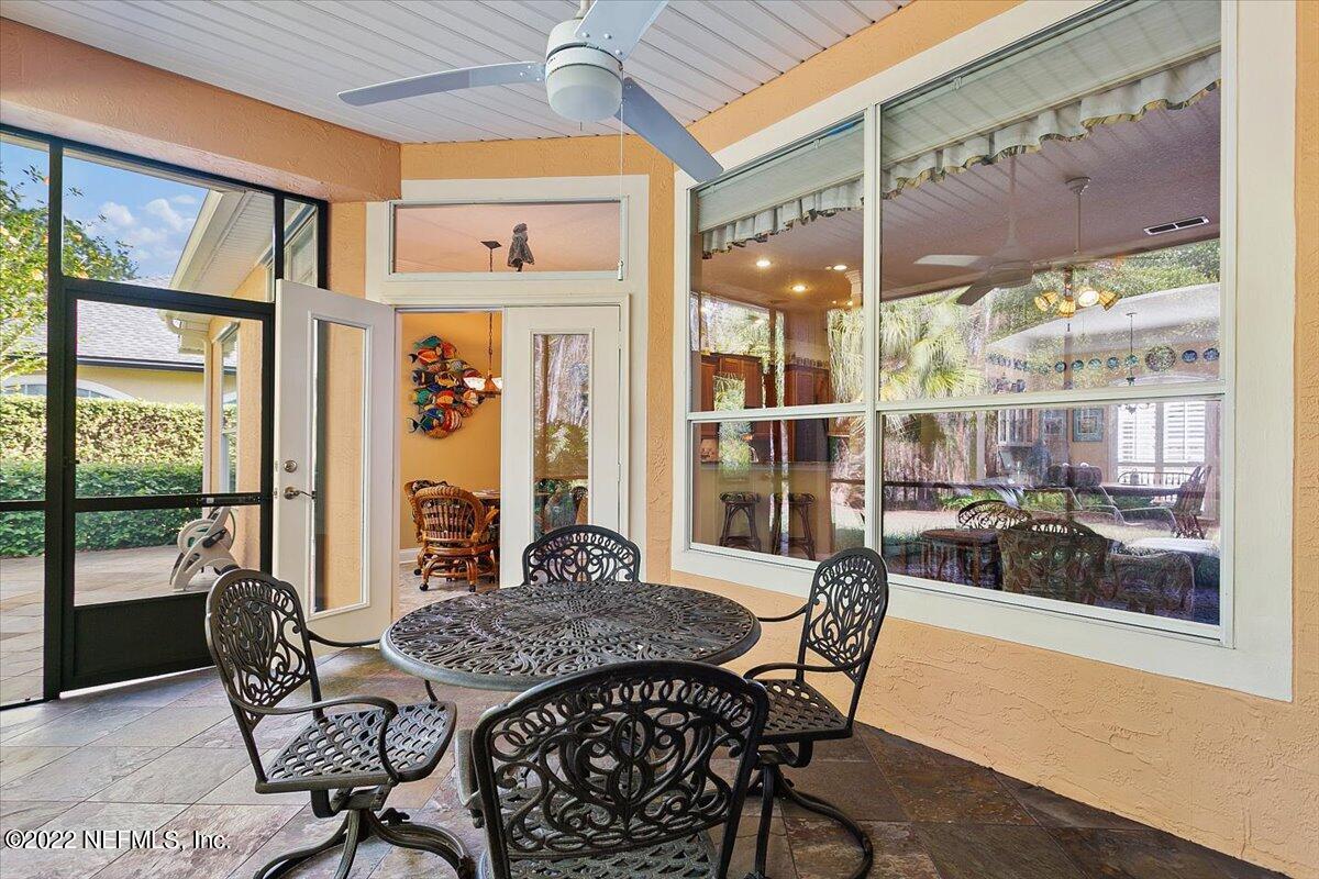 184 Edge Of Woods Road St. Augustine, FL 32092 - Photo 20 of 24 a view of a dining room with furniture window and outside view