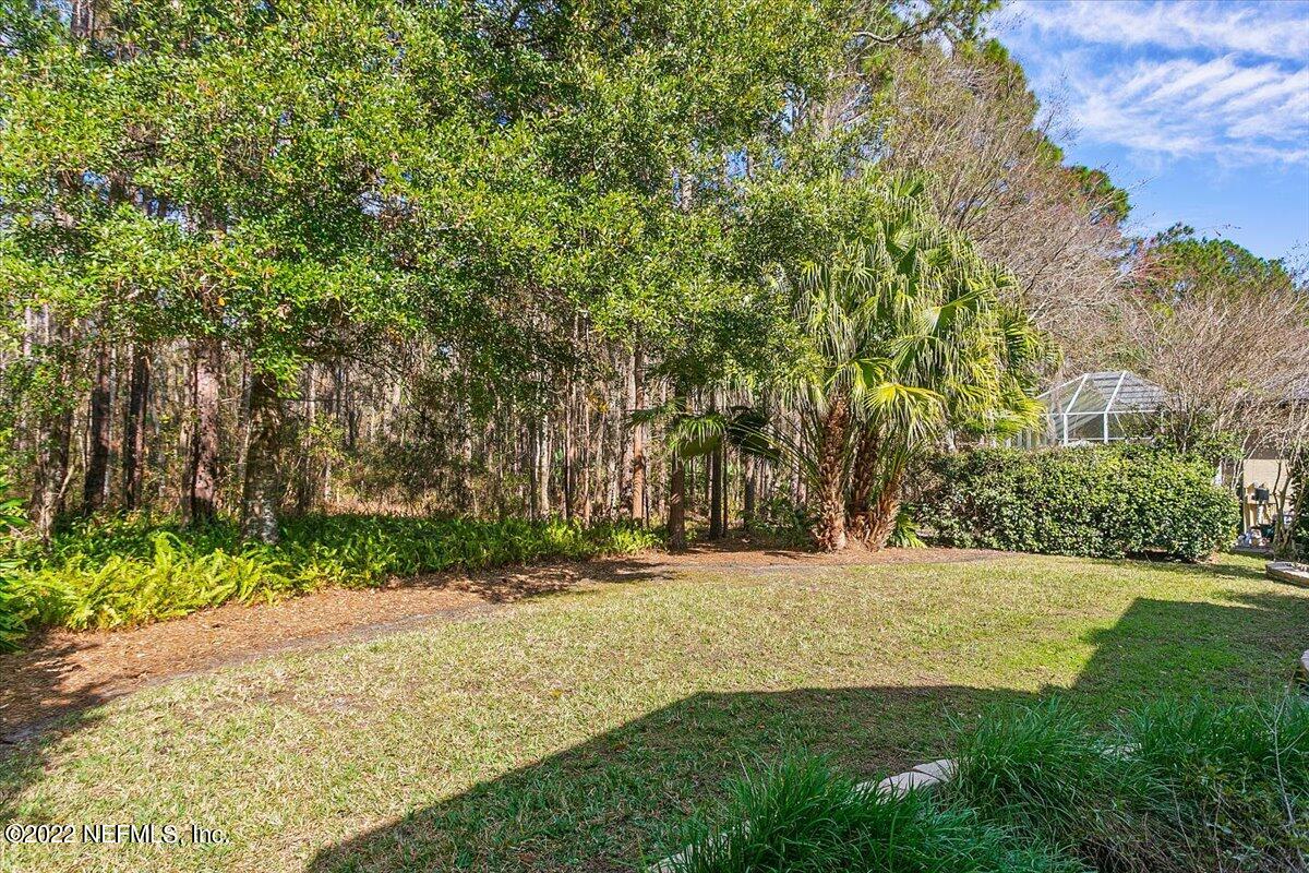 184 Edge Of Woods Road St. Augustine, FL 32092 - Photo 22 of 24 a view of yard with green space