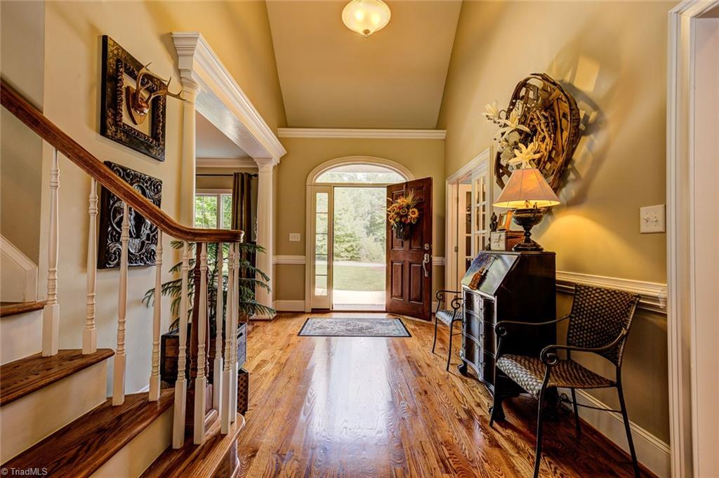 122 Augusta Place High Point, NC 27265 - Photo 2 of 30 The elegant entry opens to a formal dining room and main level office. Gorgeous hardwood floors and lovely natural light.